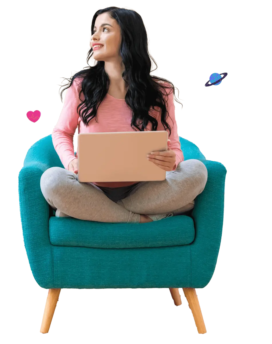 Person smiling and sitting on sofa with laptop on lap.